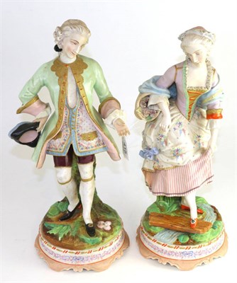 Lot 415 - A pair of French bisque porcelain figures of a lady and gentleman, late 19th century, dressed...