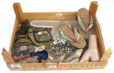 Lot 424 - Assorted curiosities including plaster model of Chinese woman's bound foot with related shoes;...