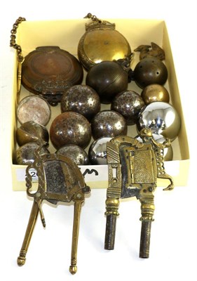 Lot 426 - A group of Asian baoding balls or Chinese stress balls and Indo Persian beetle nut cutters and ball