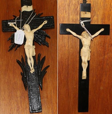 Lot 434 - A Dieppe ivory Corpus Christi, 19th century, 15cm, on an ebonised crucifix with ivory plaque; and a