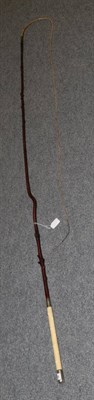 Lot 449 - An Edwardian coaching whip with a silver mounted ivory handle, London 1903