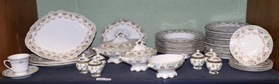 Lot 451 - A Bishop & Stonier dinner service, circa 1900, decorated with flower swags; a Staffordshire pottery