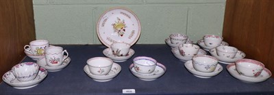 Lot 468 - A New Hall porcelain coffee cup, tea bowl and two saucers, circa 1790, painted with baskets of...