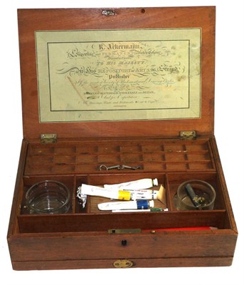 Lot 474 - An 19th century mahogany paint box with hinge top and hidden drawer containing an arrangement...