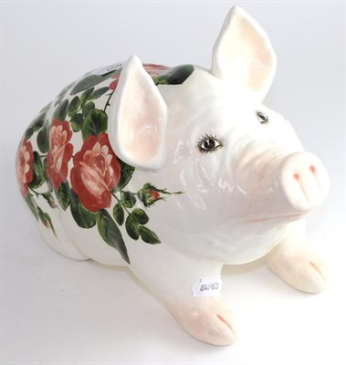 Lot 497 - A Griselda Hill Wemyss pottery pig, painted with pink roses, painted mark, 40cm long