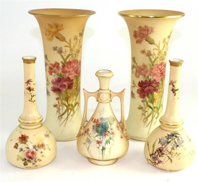 Lot 500 - A matched pair of Royal Worcester porcelain beaker vases, 1911 and 1917, decorated with flowers...