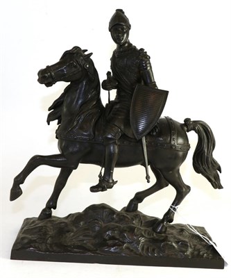 Lot 504 - A late 19th/early 20th century bronze figure group modelled as a knight on horseback, 35cm high