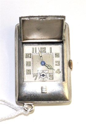 Lot 523 - An Art Deco nickel plated purse watch, circa 1920, lever movement, silvered dial with luminous...