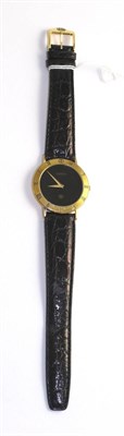 Lot 531 - A plated wristwatch, signed Gucci, circa 2000, quartz movement, black gloss finished dial,...