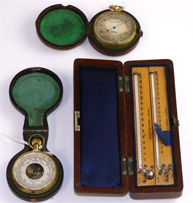 Lot 536 - Two cased pocket barometers, one signed Sewill, Liverpool, and a Negretti & Zambra mahogany...