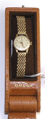 Lot 537 - A lady's 9ct gold wristwatch, signed Omega, 1955, lever movement signed and numbered 14247899,...