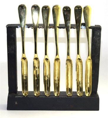 Lot 563 - Set of seven paktong marrow scoops with an associated stand