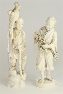 Lot 594 - A Japanese ivory okimono, Meiji period, of a gardener standing a bunch of flowers, a basket by...