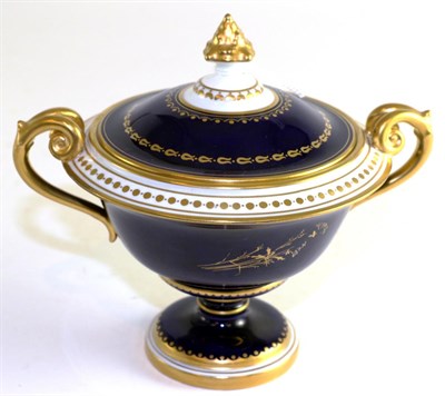 Lot 597 - A Royal Crown Derby porcelain twin-handled urn and cover, 1906, painted by Albert Gregory with...