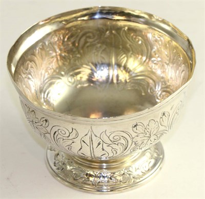 Lot 604 - A George II silver sugar bowl, Edward feline, London 1742, the spherical body flat chased with...