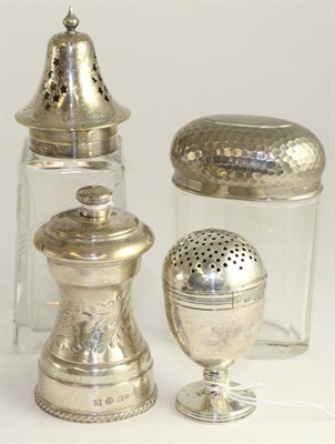 Lot 608 - A Victorian silver pepperette, London 1878, a silver pepper grinder, Birmingham 1979, toilet...