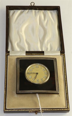 Lot 612 - A tortoiseshell easel timepiece, circa 1930, lever movement, gilt coloured dial with luminous...