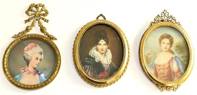 Lot 616 - Three portrait miniatures on velum depicting ladies contained within gilt metal frames