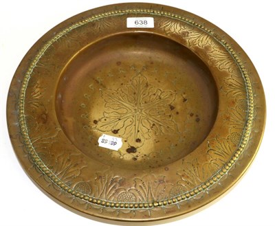 Lot 638 - A brass alms dish, probably German, 17th century, engraved with stylised foliage within a...