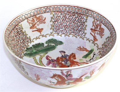 Lot 642 - A Chinese Export style porcelain bowl painted in famille rose enamels with European hunting scenes