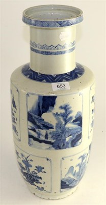 Lot 653 - A Chinese porcelain Rouleau vase in Kang Xi style painted on a glazed blue with panels of...