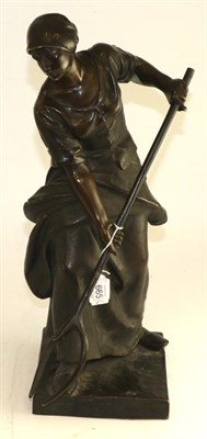 Lot 665 - Bronze figure of a lady with a pitchfork, 48cm high