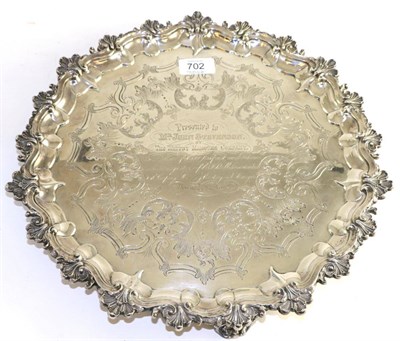 Lot 702 - ~ A Victorian silver salver, by SS, London, 1874, retailed by Goldsmiths Alliance, shell and scroll