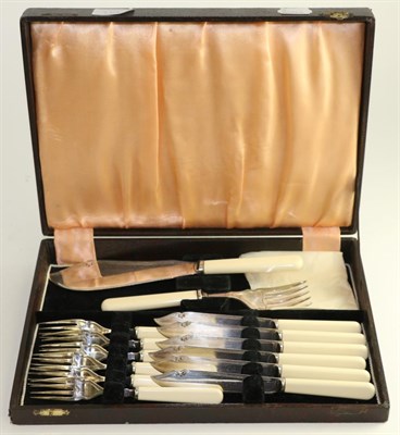 Lot 709 - A set of twelve silver and mother-of-pearl fruit knives and twelve forks, with pearl handles,...