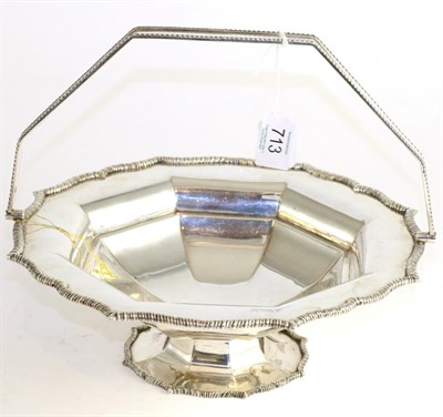 Lot 713 - An Edwardian silver basket, Sheffield 1906, of shaped octagonal form with overhead swing...