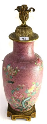 Lot 756 - A gilt metal mounted Chinese porcelain baluster vase, 19th century, painted in famille rose enamels