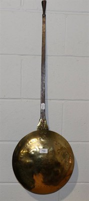 Lot 759 - A Charles II brass warming pan, the cover engraved with Royal Arms and inscribed GOD SAVE...