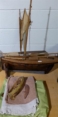 Lot 773 - A gaff-rigged pond yacht with painted hull, mast and sails, and unpainted tender; together with...