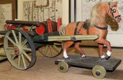 Lot 774 - A 19th century wooden horse and brewers dray on wheels, horse with real horsehair mane and...