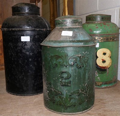 Lot 775 - A 19th century green painted tole ware tea canister numbered 28, height 38cm; another green example