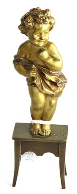 Lot 779 - Affortunato Gory: a gilt and patinated bronze figure of a child, loosely draped, standing on a...