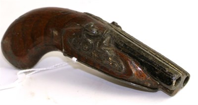 Lot 789 - An early 19th century cold painted pewter snuff box in the form of a double barrel flintlock pocket