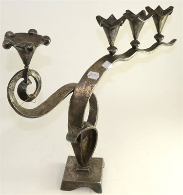 Lot 793 - # A four branch polished metal candelabra, 45cm