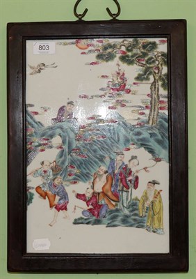 Lot 803 - A Chinese porcelain plaque decorated in famille rose enamels with sages and attendants in...