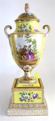 Lot 819 - A painted porcelain vase, cover and stand, decorated with floral sprays and courting couples,...