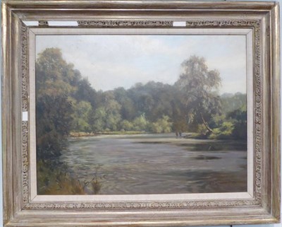 Lot 1056 - Attributed to Samuel John Lamorna Birch RA (1869-1955) Figures at rest beside a river, 44.5cm...