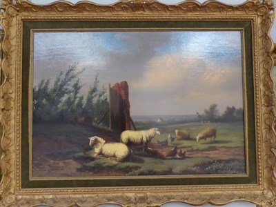 Lot 1193 - J L van Leemputten (19th century) Dutch, Sheep and poultry grazing in an extensive landscape,...