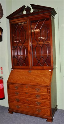 Lot 1235 - A Georgian style mahogany and striking inlaid bureau bookcase, 108cm wide