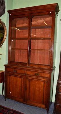 Lot 1245 - ~ A late Victorian walnut glazed bookcase, 122cm wide