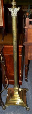 Lot 1266 - An Edwardian brass Corinthian column telescopic standard lamp, 195cm tall including fitting...