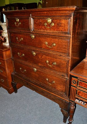 Lot 1271 - {} An 18th century oak five drawer chest on stand, 103cm wide