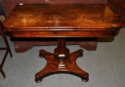 Lot 1273 - A William IV rosewood foldover tea table, 2nd quarter 19th century, the swivel top above a...