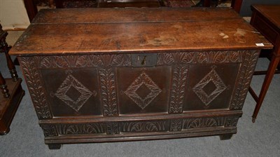 Lot 1275 - # A 17th century joined oak chest with hinged lid above three lozenge carved panels, 125cm by...