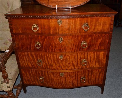 Lot 1278 - A mahogany serpentine fronted chest, 102cm wide