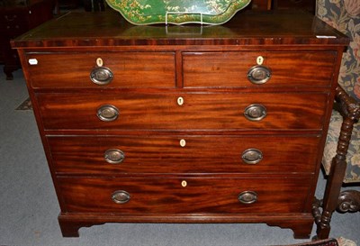 Lot 1283 - A George III mahogany chest of drawers, 121cm wide