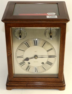 Lot 1285 - ~ A mahogany quarter striking mantel clock, retailed by Mason, Middlesbrough, circa 1910, case with